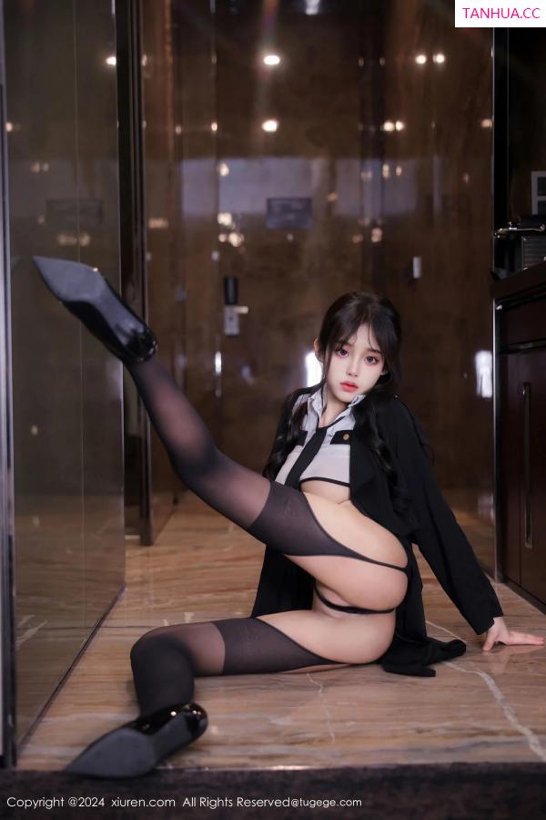   [XiuRen]高清写真图 2024.03.21 No.8265 王心悦 美腿黑丝第26张图片